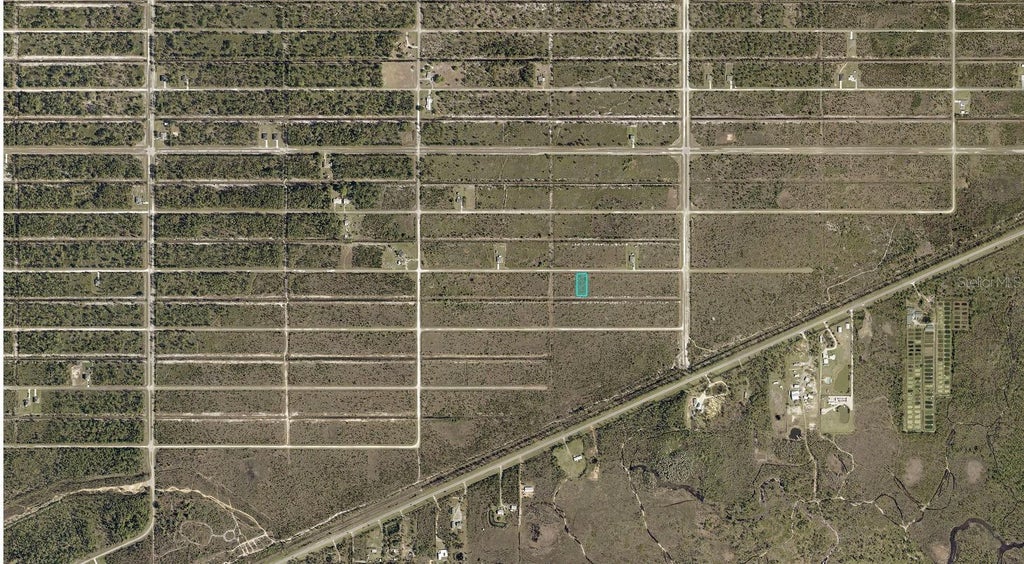 Photo of 419 Calendula Drive, Indian Lake Estates, FL 33855 (MLS # A4711412)