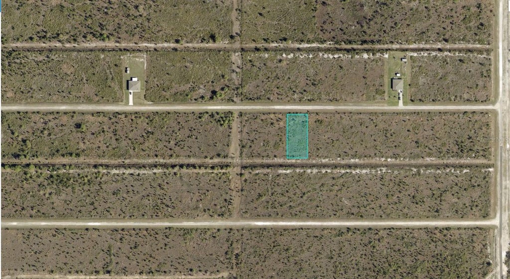 Photo of 419 Calendula Drive, Indian Lake Estates, FL 33855 (MLS # A4711412)