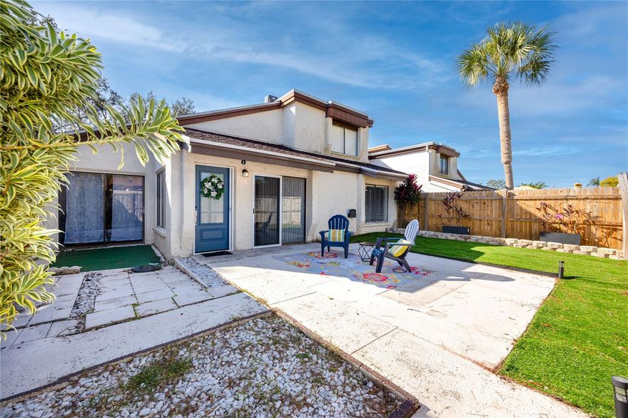 Charming two-story unit featuring vaulted ceilings, updated bathrooms, new flooring, and a convenient first-floor primary bedroom. The kitchen includes a stainless-steel French door refrigerator, range, dishwasher, and vent hood, with washer/dryer hookups available. Enjoy a fenced private yard and a one-car garage. Located in a well-kept community with a pool, tennis courts, and RV/boat parking. Just minutes from shopping, dining, and only 15 minutes to the beach. A comfortable, well-maintained home in a prime location/ Ready for its next owner.