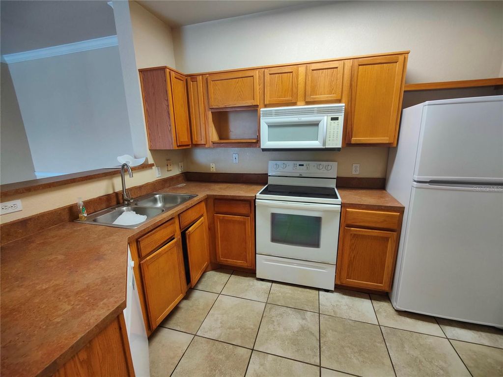 Photo of 3737 Castle Pines Lane #4424, Orlando, FL 32839 (MLS # S5147928)