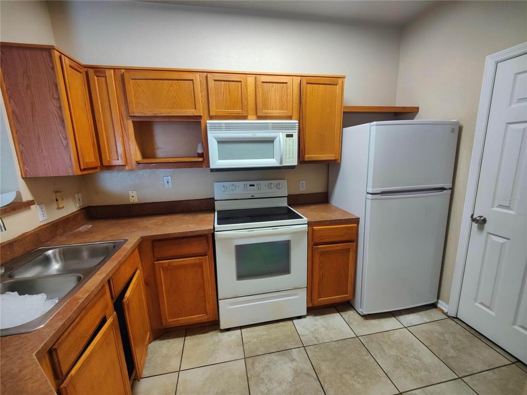 Photo of 3737 Castle Pines Lane #4424, Orlando, FL 32839 (MLS # S5147928)