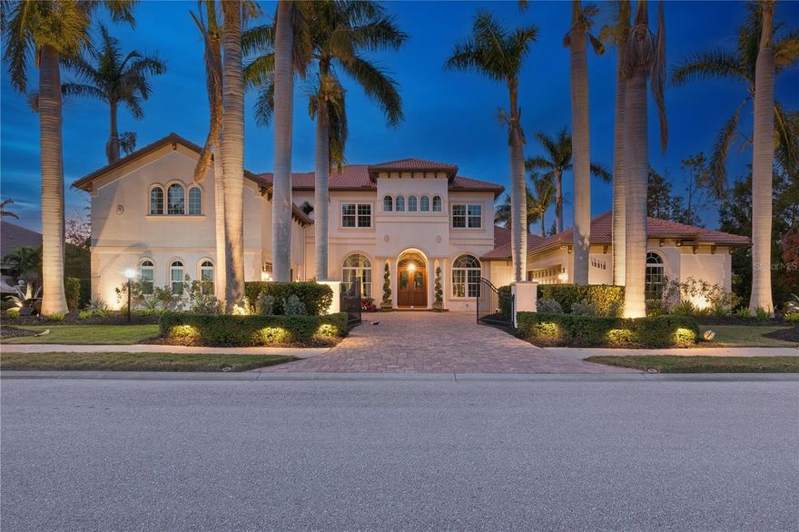 Exquisite Lakefront Estate in The Country Club at Lakewood Ranch~ A Spectacular Family Home ~
Over 6100 Sq ft of space to live, entertain, play and relax.
A bespoke luxury estate in one of the most private enclaves in Lakewood Ranch Country Club. Tucked away on a private ½-acre cul-de-sac lot, this masterpiece is a stunning blend of elegance and modern sophistication, from every room, offering breathtaking lake and nature views that create an unparalleled sense of tranquility.
Step inside to a bright, airy space, high ceilings, and an open floor plan that seamlessly integrates gracious living and grand entertaining. From the moment you enter, walls of impact glass sliders invite you to experience the seamless connection between indoor and outdoor living, where the enclosed resort-style pool, spa, tropical oasis and lake serve as the breathtaking backdrop.
This home was designed and appointed for the discerning buyer. ~
1st Floor :
Living Room with Fireplace * Separate Dining Room * Gourmet Chef’s Kitchen with Subzero and Viking appliances, a breakfast bar, a spacious dining area, large island * Family Room * Billiard Room * Office * Owner’s suite with spa inspired bath and two walk in closets * Laundry Room * Powder Room * Custom Millwork~
2nd Floor: 
Bonus Office * Bedroom 2 with ensuite bath * Bedrooms 3 and 4 with Jack and Jill bath * Theatre Room * Game/Great Room with a large balcony that looks out over the pool and expansive sanctuary.~
Outdoors:
Pebble Tec pool with spa and fountain *multiple seating areas * conversation area with fireplace * outdoor kitchen with bar * Professional Lighting *Lavish Tropical Landscaping * 2 Level Screen Enclosure
*Two oversized two-car garages * Corner Lot.~
One of the most appealing things about this home is the multiple versatile spaces provide ultimate flexibility and how this home will live best for you. 
You can see that this home has so many wonderful features … too many to list them all … so schedule an appointment today. It would be my pleasure to give you a tour.