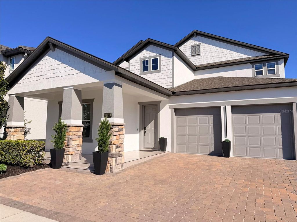 Photo of 12779 Westside Village Loop, Windermere, FL 34786 (MLS # O6377817)