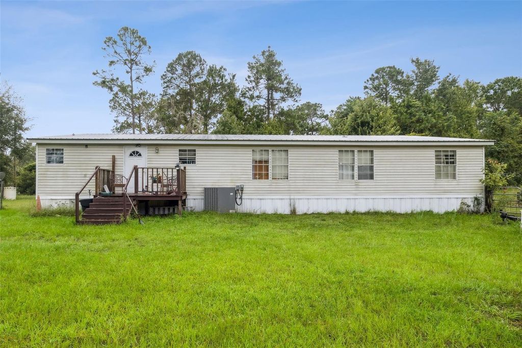 Photo of 120 Shaggy Lane, Palatka, FL 32177 (MLS # GC538610)