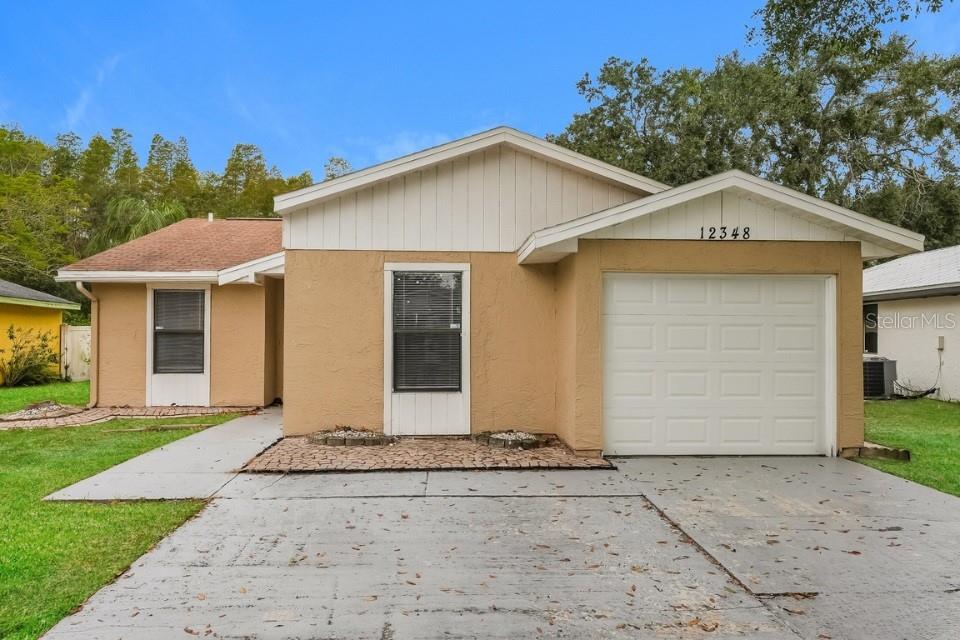 Photo of 12348 Witheridge Drive, Tampa, FL 33624 (MLS # TB8540354)