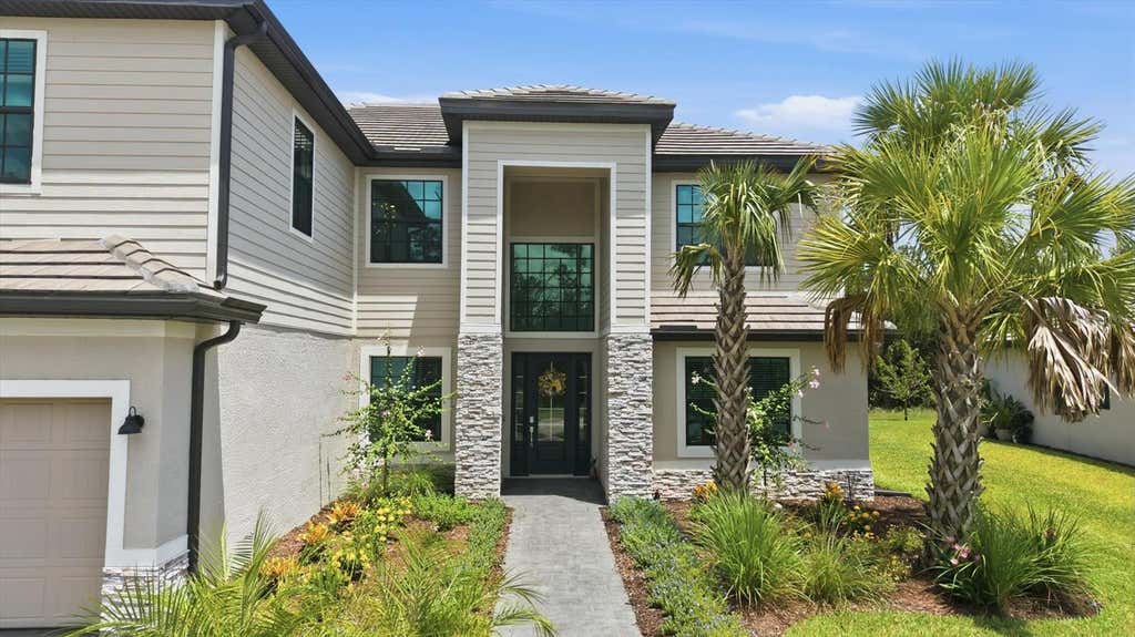 Photo of 11035 Hanging Vine Drive, Fort Myers, FL 33913 (MLS # C7528734)