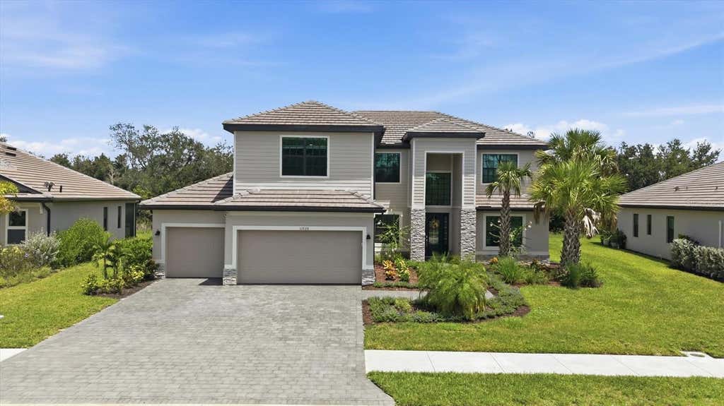 Photo of 11035 Hanging Vine Drive, Fort Myers, FL 33913 (MLS # C7528734)