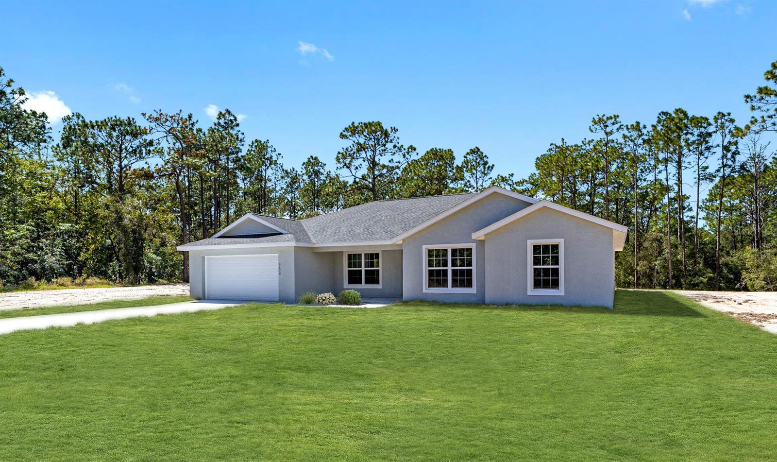 Under Construction. Beautiful new construction home! Located on Just under an Acre of Land in the Sought After, Growing Community of Rainbow Lakes Estates. Luxury Plank Vinyl flooring throughout all living and common areas and tile in bathrooms. Zero Carpet! Open floor plan with dedicated dining room and large kitchen island area, four bedrooms, two bath, large covered lanai. All done in neutral, pleasing colors. Inside laundry with W & D hook-ups. Walk-in closet in Master bedroom. Stainless steel appliance package in the kitchen. This home will have shaker-style cabinets and light luxury granite countertops. This home is expected to be completed December 2023. Please see attached documents from Builder (Builders Contract Addendum & Warranty) Actual photos are currently unavailable. Any photos depicted are for illustration purposes only and only to show layout. Some pictures have been virtually staged. Floor plan displayed is our standard plan and garage orientation may vary on actual home. Interior and exterior colors, finishes, and garage orientation will vary for actual home. Information is deemed correct, but no guarantee made. The home is under construction. Expected completion date is an estimate only. Any dimensions listed are approximate.