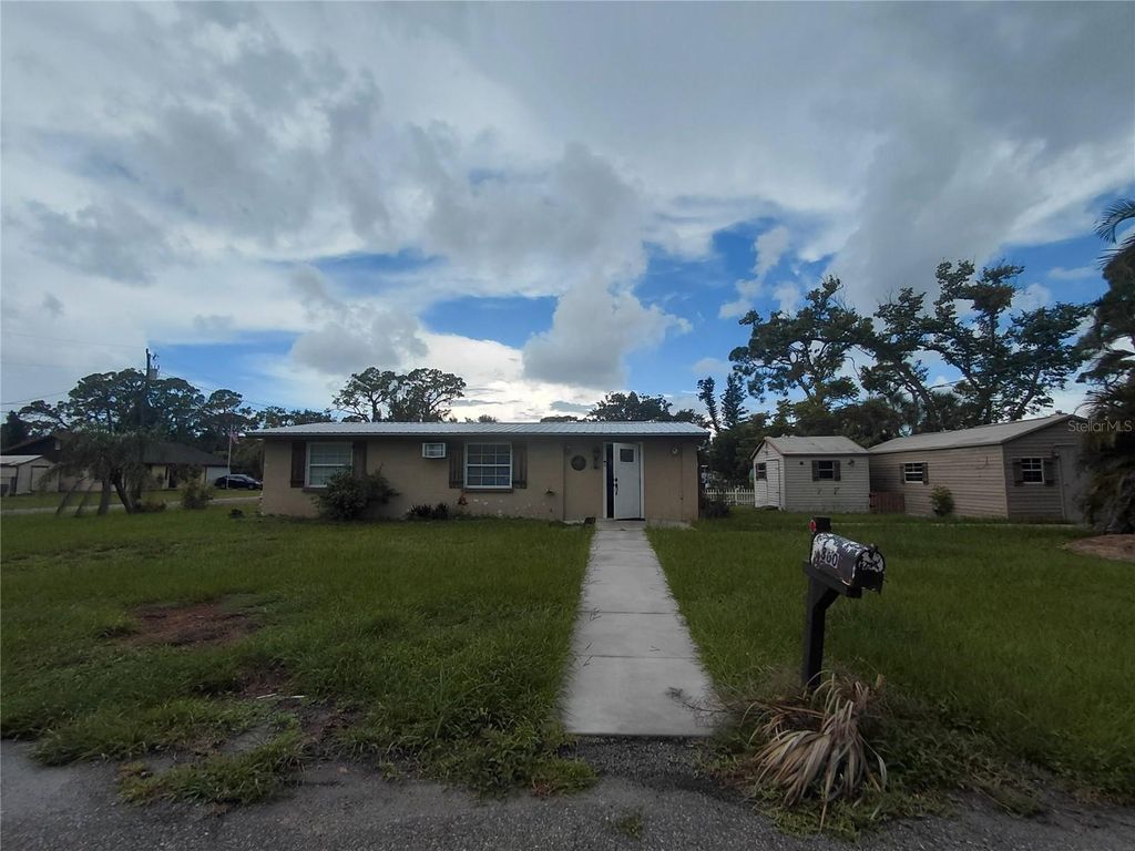 Photo of 860 Jacaranda Street, Englewood, FL 34223 (MLS # V4944634)