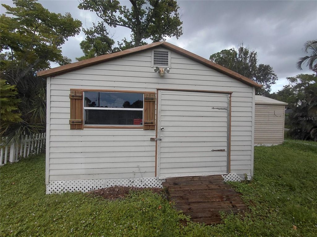 Photo of 860 Jacaranda Street, Englewood, FL 34223 (MLS # V4944634)