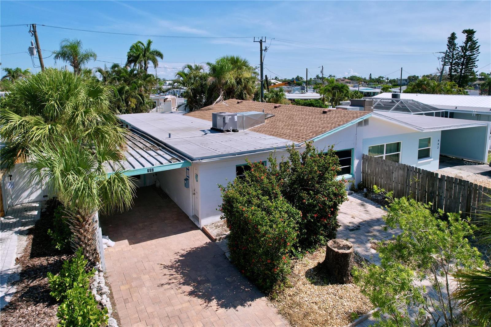 We are thrilled to share an exciting new listing with you: a nicely remodeled villa in the highly sought-after Seaside Gardens community. This property has undergone a complete interior transformation, presenting a fresh and modern living space that's ready for its new owner to personalize with their unique style.
One of the standout features of this villa is its brand-new interior, meticulously updated with a keen eye for modern aesthetics. The entire living area boasts sleek and durable epoxy flooring, offering both a contemporary look and easy maintenance. Additionally, the villa includes a convenient carport for parking and a generously sized storage room, perfect for housing bikes, beach gear, and any other items you might need to tuck away. We believe this villa presents a fantastic opportunity for anyone looking for a move-in ready home in a desirable location that is close to the beach, boat ramp, dog park and plenty of great shops and restaurants. Weekly rentals are allowed! New AC 2025. New roof 2023.
We’re confident this villa will be a perfect fit for a variety of lifestyles, and we'd love to discuss it with you further.
