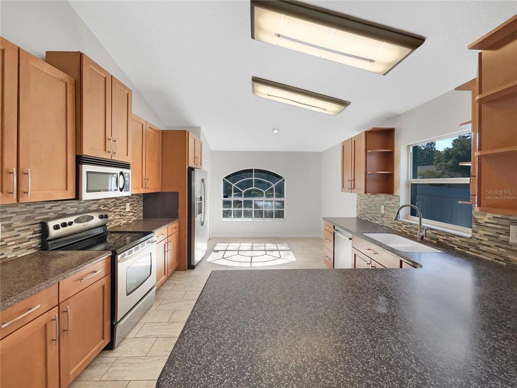 Photo of 3854 Bellewater Boulevard, Riverview, FL 33578 (MLS # O6359695)