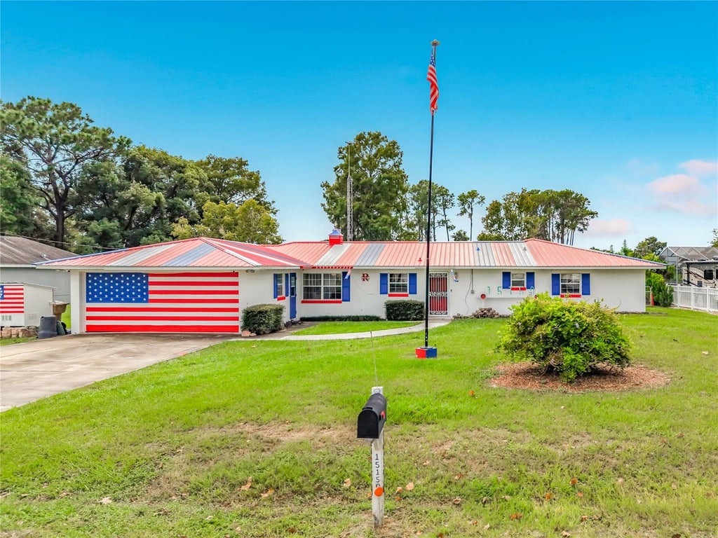 Photo of 15150 Colley Drive, Tavares, FL 32778 (MLS # O6448700)