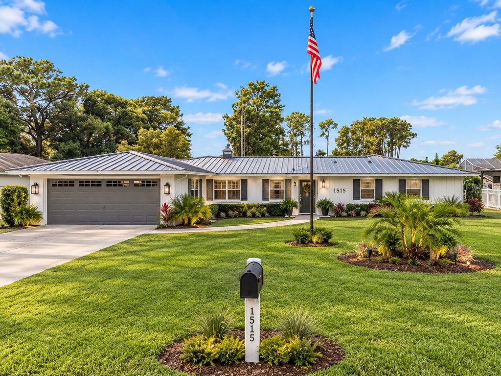 Photo of 15150 Colley Drive, Tavares, FL 32778 (MLS # O6448700)