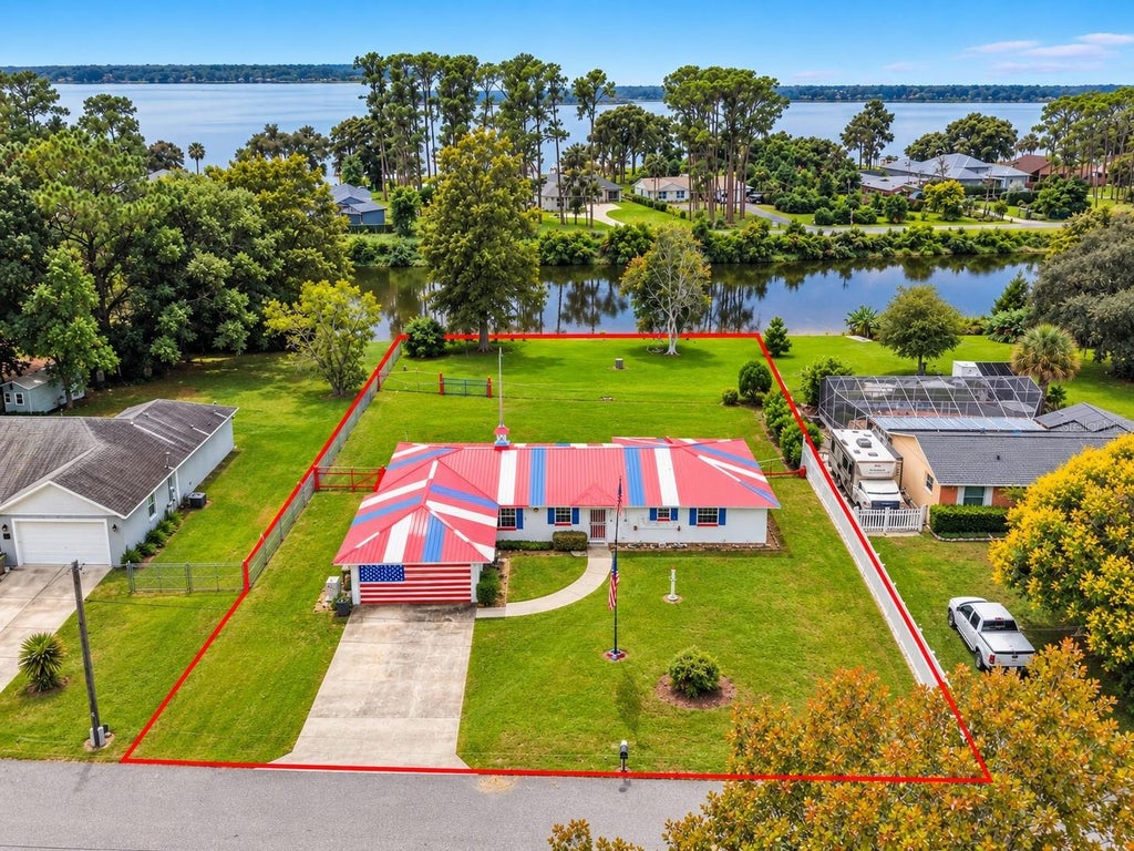 Photo of 15150 Colley Drive, Tavares, FL 32778 (MLS # O6448700)