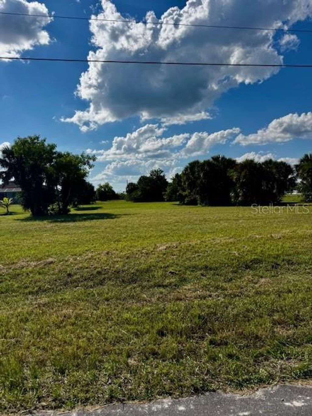 Photo of 16275 Cayman Lane, Punta Gorda, FL 33955 (MLS # O6334241)