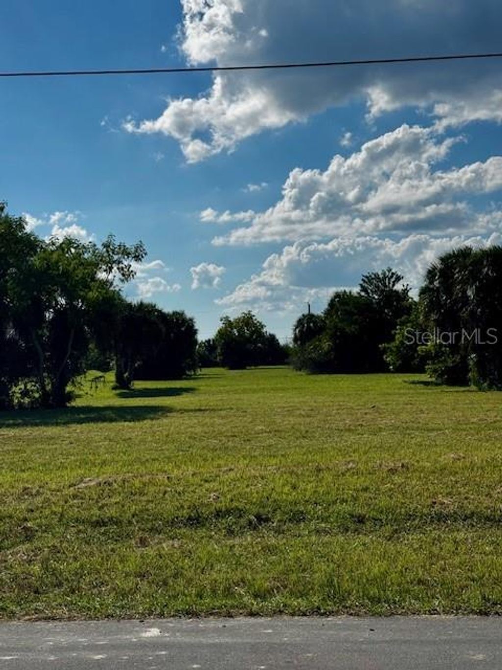 Photo of 16275 Cayman Lane, Punta Gorda, FL 33955 (MLS # O6334241)