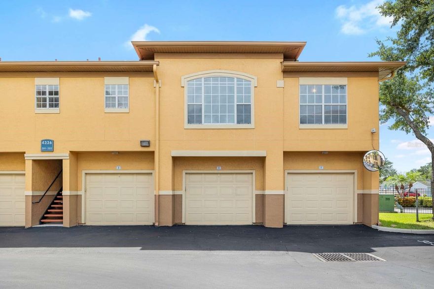 Updated carriage home with a PRIVATE GARAGE. No walls shared with any neighbors. All new paint and flooring throughout. Plumbing and electrical has been updated. The condo features tall ceilings, plenty of natural lighting, ceiling fans, laundry closet and a chef-style kitchen with white Quartz countertops. The French doors in the living room lead to the screened balcony where you can enjoy sunset views or a morning cup of coffee. The association has recently installed all new roofs, all new exterior paint, all roads have been repaved, parking spaces repainted, new security gates, security cameras, and much more. Included in the rent is access to the community pool, 24/7 access to the fitness center, game room, billiards room, office/printer room, movie room, car wash station, 1 mile long boardwalk through the natural preserve and the kayak/paddle board launch!