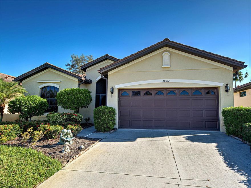 Serene Living in Venetian Falls – Enjoy tranquil park-like views from this beautifully appointed Florence model featuring an expansive  paver’d screened lanai—ideal for basking in the sun or relaxing in the shade. Nestled within the sought-after 55+ gated community of Venetian Falls, this two-bedroom plus den, two-bath home offers a spacious open and split floor plan enhanced by elegant crown molding throughout the main living areas. The kitchen is stylish & functional with richwood cabinetry with convenient pull-out shelves, sleek granite countertops and a sunlit dinette area with large windows and sliding glass doors overlooking the lush landscape. Comfortable Bedrooms and Baths too! The primary suite has engineered hardwood flooring, private lanai access, and dual closets with a luxurious en-suite bath featuring dual sinks and a grand Roman shower with built-in seating. Guest bedroom with an en suite bath with easy access from the foyer. Additional features include an Installed security system for peace of mind a Two-car garage with durable speckled epoxy flooring. Venetian Falls offers an active lifestyle with a wealth of amenities- heated pool, spa, and resistance walking pool, State-of-the-art fitness center, billiards room, bocce courts, putting green, Full-time activities director and vibrant social calendar! Low-Maintenance Living! Enjoy low HOA fees that cover cable, internet, ground maintenance, reserves, and full access to resort-style amenities. Best of all—no CDD fees! Prime Location Just minutes from the pristine Gulf beaches, charming shops, delicious restaurants, and the historic Venice MainStreet!
