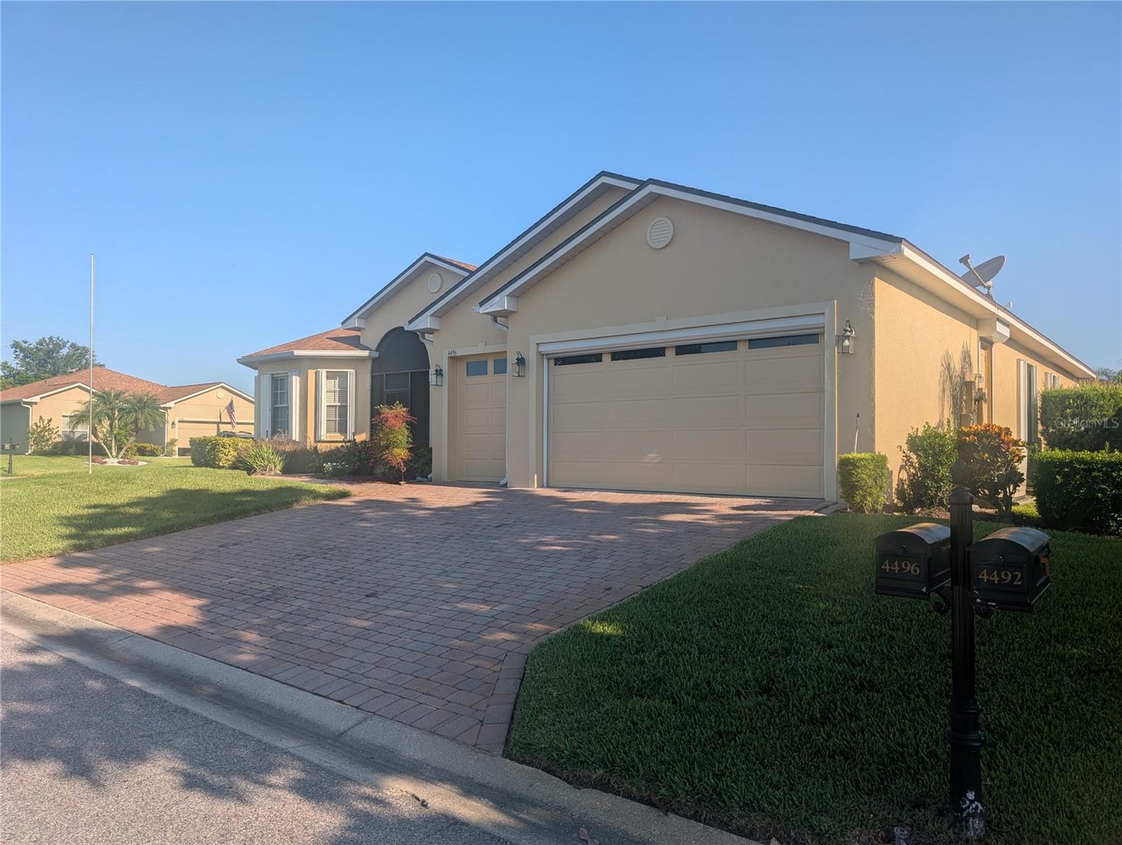 THIS IS THE ONE YOU HAVE BEEN WAITING FOR!! CDD bond is PAID IN FULL. This spacious 3-bedroom, 2-bath gem offers comfort and style in Lake Ashton Golf Community. From the moment you arrive, the screened front porch invites you to relax and enjoy the peaceful surroundings. The open split floor plan is both elegant and practical. The spacious owner's suite is a true retreat, featuring French doors, dual walk-in closets, and a spa-inspired en suite bath with a walk-in tub and separate shower. The kitchen is a chef's dream with granite countertops, stainless steel appliances, and beautiful deep rich color cabinets with a built-in wine rack. The home is enhanced by beautiful tile flooring throughout and a new roof installed in 2020. This home is packed with valuable upgrades, including a whole-house generator for peace of mind and an electric roll-down garage screen, and a golf cart included. Situated on a corner lot with access to resort-style amenities. Residents enjoy a clubhouse with a grand ballroom, fitness center, movie theater, bowling alley, and card rooms. The fitness and wellness clubhouse features an indoor heated pool, spa, and additional workout facilities and more. Outdoor enthusiasts can take advantage of the 2-18-hole championship golf course, tennis and pickleball courts, bocce ball, shuffleboard, and scenic walking trails. With a full-service restaurant, gated security, and a vibrant calendar of social events and more this home truly has it all. 2.62 VA ASSUMABLE MORTGAGE FOR QUALIFIED BORROWERS
