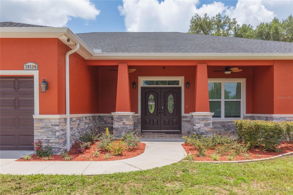 Photo of 39534 Sunburst Drive, Dade City, FL 33525 (MLS # TB8527572)