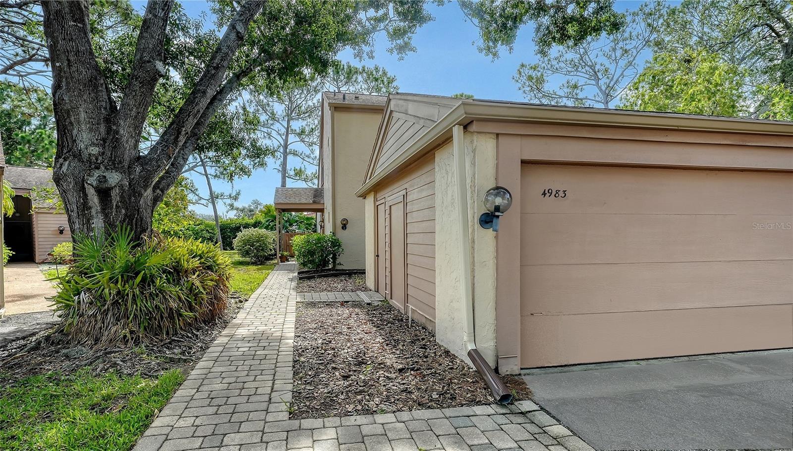 Centrally located townhouse, with main bedroom on first floor, in The Meadows, one of Sarasota’s sought-after neighborhoods just 15 minutes from downtown. A canopied street and a two-car garage welcome you home. Inside you’ll be greeted by a charming atrium that fills the space with gorgeous indirect light and cathedral ceilings in the living room providing an open and airy feeling. You will love relaxing in the 20-foot screened-in lanai overlooking a tranquil and lush garden. Upstairs, you will find soaring ceilings, abundant natural light, and the other two bedrooms and a bath. All across the street from the heated community pool and a mile to all the fun The Meadows has to offer. A five-star location on 1,600 park-like acres, The Meadows is a resort lifestyle community 15 minutes from downtown. Residents enjoy 14 miles of biking and hiking trails, fun-filled activities, fitness center, Junior Olympic pool, pickleball courts, and pay-to-play in a top tennis complex. Its prime location places you near award-winning beaches, remarkable arts and culture, Nathan Benderson Park, the upcoming Mote SEA Aquarium and Sarasota Orchestra, and The Mall at University Town Center, a world-class shopping, entertainment and dining destination. A fabulous Florida lifestyle awaits.