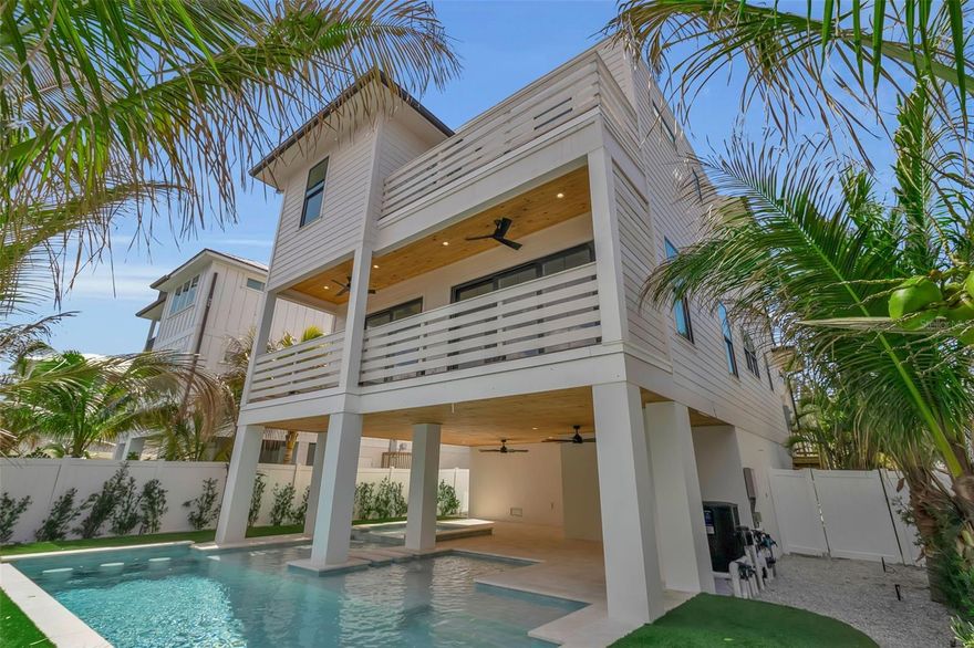 Newly Constructed exceptional investment & coastal retreat on Anna Maria Island - An outstanding opportunity to own a new construction luxury residence — ideal as a high-performing short-term rental investment, premium vacation home, or full-time coastal residence. Delivered fully furnished and benefiting from Bradenton Beach’s favorable short-term rental regulations, this residence offers exceptional flexibility for those seeking both lifestyle and income potential.

Final home finishes being complete, updated pictures to come. 

With 7 bedrooms and 6.5 bathrooms, this expansive property was designed to accommodate large groups comfortably, making it perfectly suited for maximizing vacation rental income potential while still offering a refined, private living experience.

Just moments from the pristine beaches, this home delivers the ultimate island lifestyle paired with strong income-producing capability.

Designed with comfort and entertaining in mind, the expansive main living space features refined finishes, abundant sunlight, and a natural connection between the interior and exterior living areas. Large openings invite the outdoors in, creating a bright and welcoming coastal atmosphere.

Outside, a private backyard retreat awaits, highlighted by a heated saltwater pool and spa with ample room for lounging and entertaining. It’s an ideal setting to recharge after a day on the sand or enjoy peaceful evenings under the island sky.

Above it all, the rooftop terrace offers sweeping water views and stunning sunset panoramas — a perfect backdrop for gathering with friends or enjoying quiet moments overlooking the island.

Additional features include a spacious three-car garage, generous storage, and quality construction details throughout. 

Whether you envision a full-time coastal residence, a refined second home, or a property that combines lifestyle with revenue opportunity, this remarkable home on Anna Maria Island offers a rare chance to enjoy the very best of island living — just moments from the beach and the vibrant shops and restaurants of Bridge Street.

This new build will also come with a 2-10 Builder Warranty - inquire for more details.