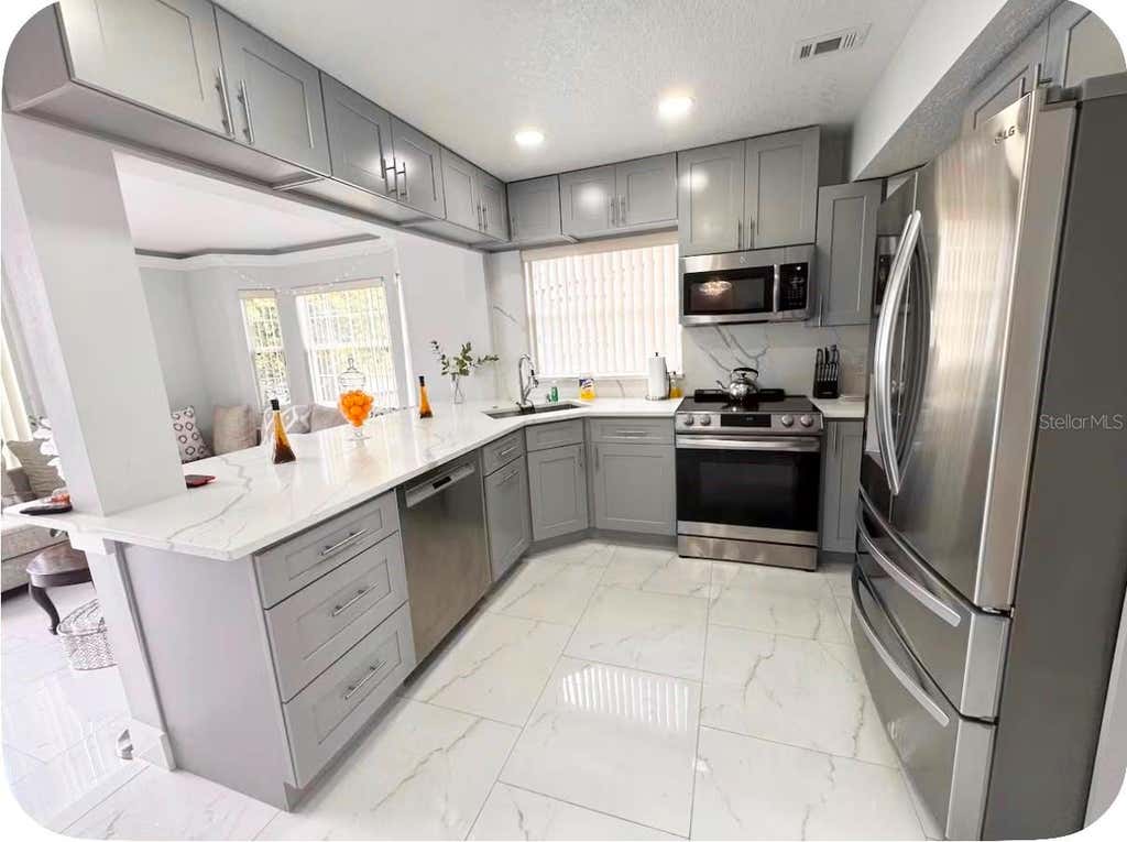 Photo of 574 Orchid Drive, Davenport, FL 33897 (MLS # O6430514)