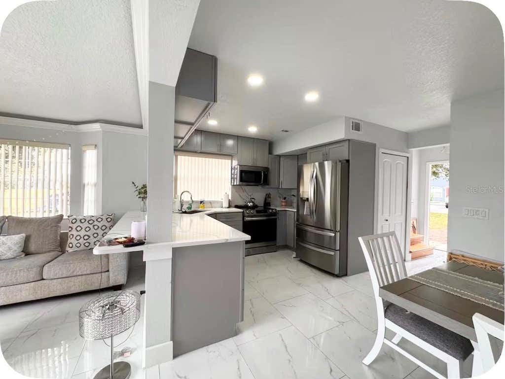Photo of 574 Orchid Drive, Davenport, FL 33897 (MLS # O6430514)