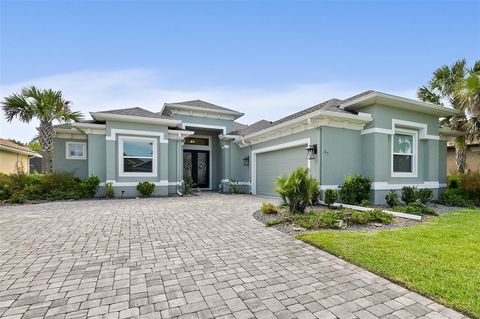 Photo of 67 N Lakewalk Drive, Palm Coast, FL 32137 (MLS # FC310554)
