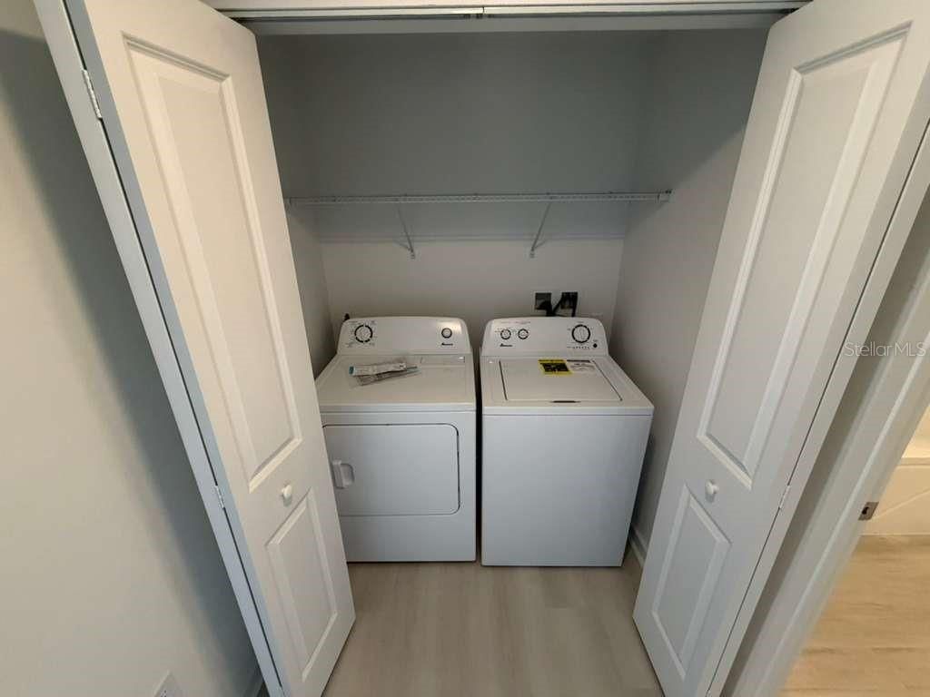 Photo of 5587 Millenia Park Boulevard #202, Orlando, FL 32839 (MLS # O6395702)