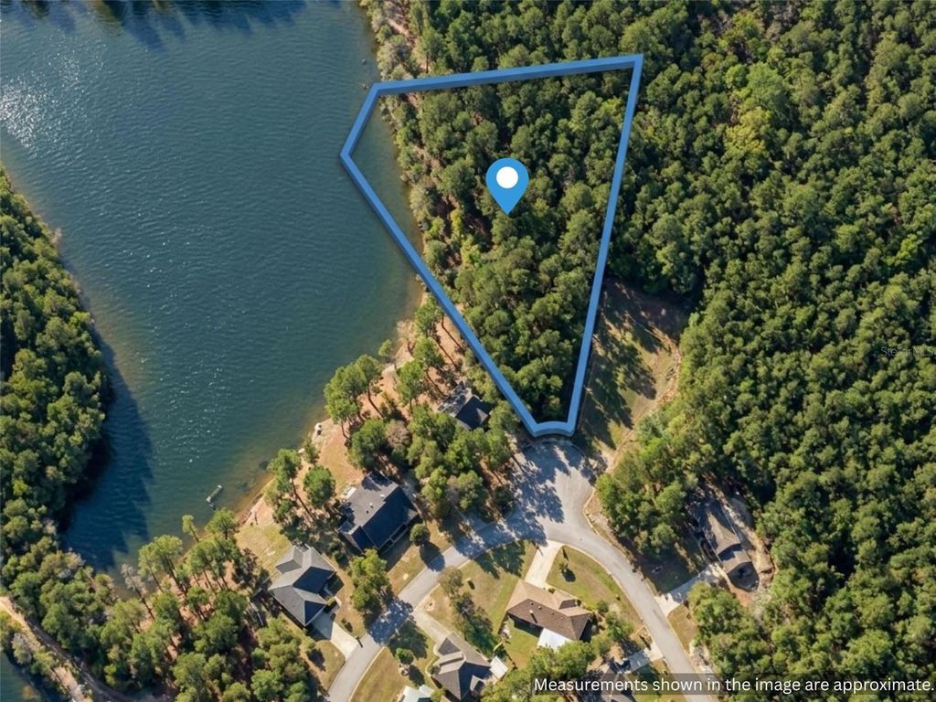 Photo of Magnolia Lake Dr, Defuniak Springs, FL 32433 (MLS # S5149417)