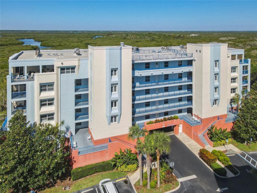 Experience Upgraded Coastal Living in Ocean Walks Premier Community. Welcome to this beautifully upgraded 3-bedroom, 2-bath condo nestled in the gated, resort-style Ocean Walk community—one of New Smyrna Beach's most desirable addresses. Ideally located on the peaceful no-drive section of the beach, this spacious 2nd-floor unit offers 1,601 square feet of elevated beachside living. Inside, you'll find a kitchen that perfectly blends style and functionality, featuring bright cabinetry, modern appliances, and thoughtful updates including a new dishwasher (2021) and a recently upgraded microwave (2024). The open-concept layout flows effortlessly into the expansive living and dining area, making it ideal for hosting or relaxing in comfort. Large sliding doors open to a private, screened-in patio, your personal retreat for enjoying serene Florida views and coastal breezes. The spacious primary suite is a true sanctuary with a generous walk-in closet, private balcony, and a spa like ensuite bathroom featuring dual vanities and a walk-in shower. Two additional bedrooms and a second full bath provide ample space for guests or family. Additional conveniences include an in-unit washer and dryer, covered parking, and a large outdoor storage closet perfect for all your beach gear. Beyond the unit, Ocean Walk offers a lifestyle rich in amenities. Residents enjoy two private clubhouses, each equipped with heated pools, hot tubs, outdoor kitchens, grill areas, and poolside showers and restrooms. Stay active with access to two fitness centers, a nature trail, and lighted courts for tennis, basketball, shuffleboard, and bocce ball. Beach access is a breeze with a private walkway and rinse-off showers located directly across the street. Building 10 is rental-friendly with a 7 day minimum, offering excellent income potential for short-term rentals. Monthly association fees cover cable TV, pools, insurance, pest control, grounds upkeep, and community security giving you peace of mind and convenience all in one. Whether you're searching for a full time residence, a beachside getaway, or a smart investment opportunity, this upgraded Ocean Walk condo checks every box. Don't miss your chance to enjoy the best of Florida coastal living!