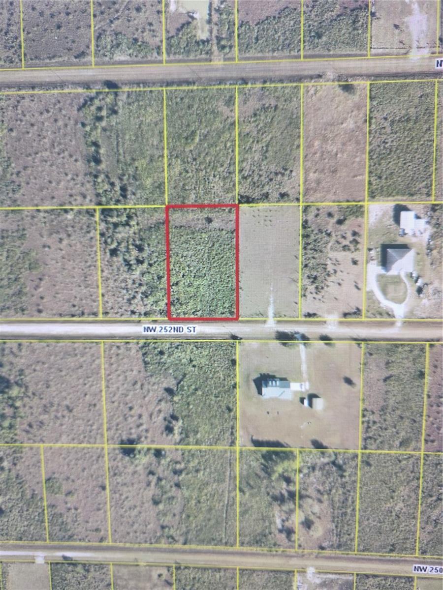 Following from State Rd 98 turn North onto NW 176th Ave. Make a left onto NW 240th St. Make a right onto NW 192nd Ave/Peavine Trail. Make a right onto NW 252nd St. The Property is 4th lot on the left.
Following from US-441 S turn west onto NW 240th St. Make a right onto NW 192nd Ave/Peavine Trail. Make a right onto NW 252nd St. The Property is 4th lot on the left.