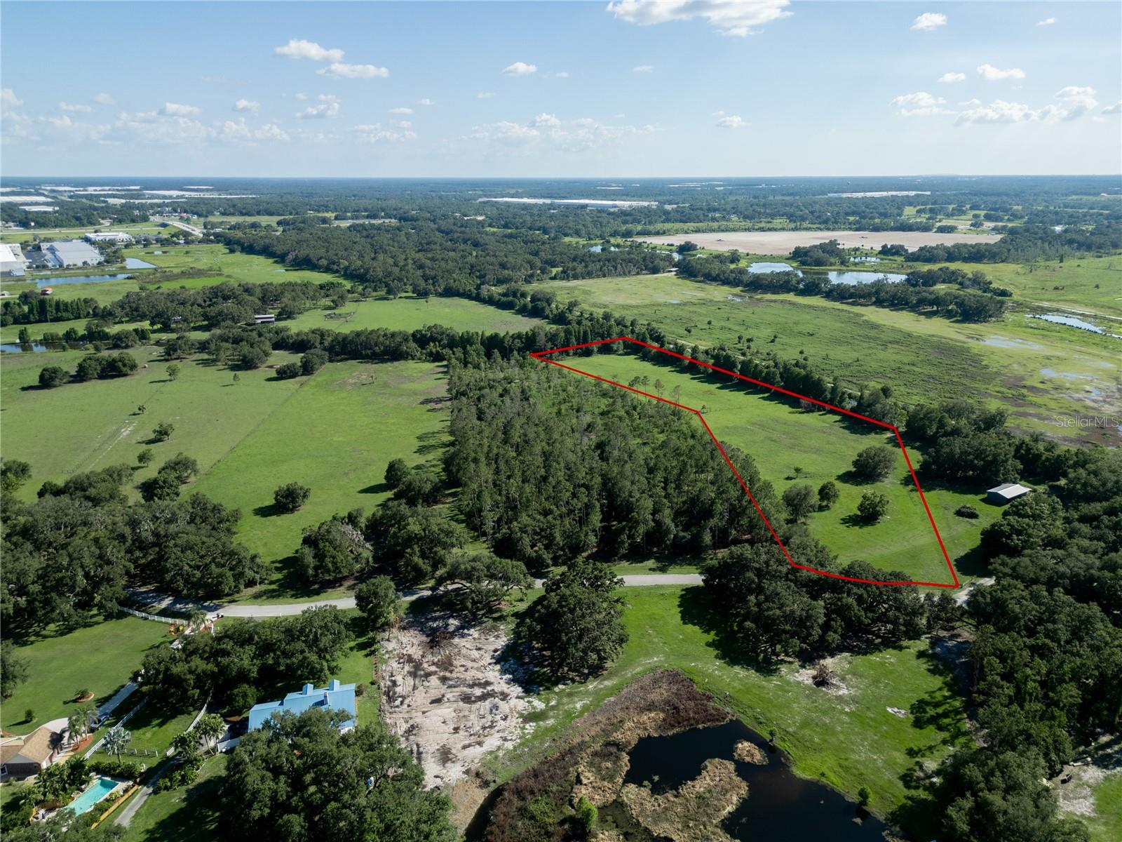 Settle into the calm of wide-open space with this 6.87-acre tract where a gentle creek runs along the side of the property, bringing movement and a little extra character to the landscape. It’s the kind of place where the days feel a bit slower, the stars a little brighter, and the possibilities wide open. This land is designated for single-family homes only—just one residence on each parcel—which helps keep the area peaceful and uncluttered. Homes must be at least 1,800 square feet under roof and set back 50 feet from the road. You’ll have a full year to complete construction once it begins. Mobile and modular homes aren’t allowed, and the property can’t be split to build more than one home, so the space and privacy stay intact. You’re welcome to bring horses or cows, and there’s plenty of room to create something special—whether that’s a working homestead, a family home with room to roam, or a quiet weekend retreat. If you’re ready for a little more land, a little more quiet, and a chance to build something that feels like yours, this might be the place to start. Come explore the property and see if it speaks to you.