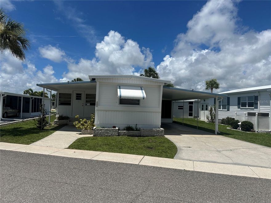 A great deal in desirable Japanese Gardens! This 2 bedroom, 1.5 bath has laminate flooring throughout, with vinyl in the bathroom and carpet in the Florida Room. The home has a split floorplan. The guest bedroom has an attached 1/2 bath. The kitchen is open to the living and dining room and has a large pantry.  A great feature of the home is the large Florida Room, about 200sf with an wall unit a/c. Japanese Gardens is an active 55+ community located about 2 miles from Manasota Beach and close to the fun, shopping, and dining of Downtown Englewood and Downtown Venice.