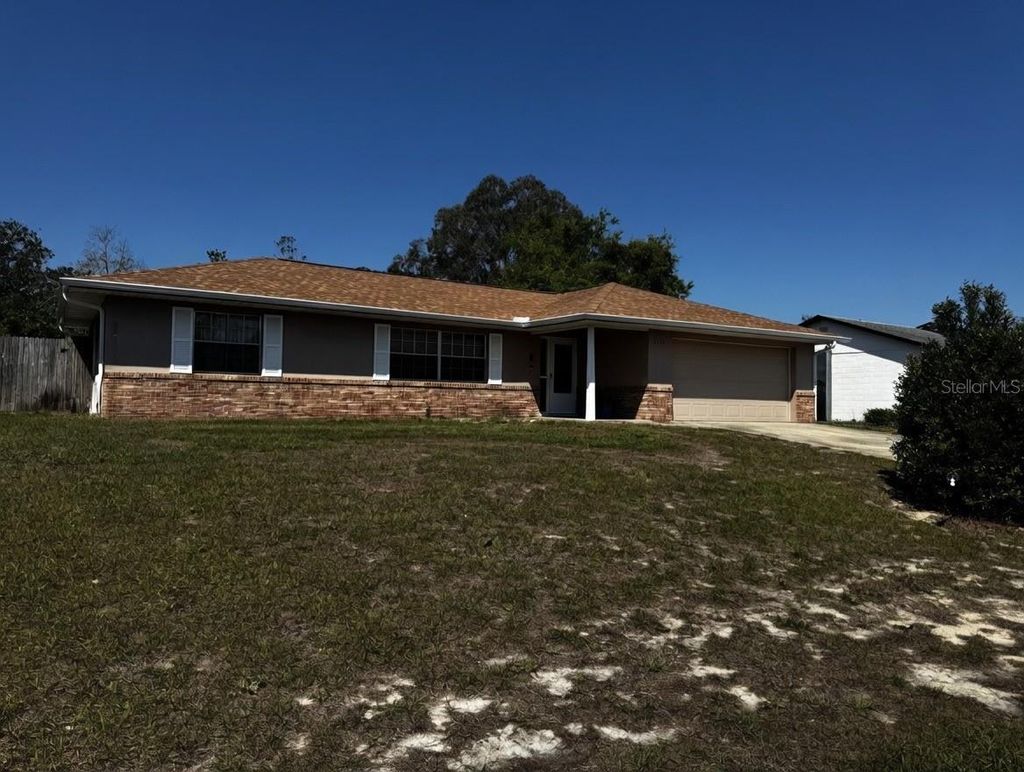 Photo of 2014 Dearing Avenue, Deltona, FL 32725 (MLS # O6394413)