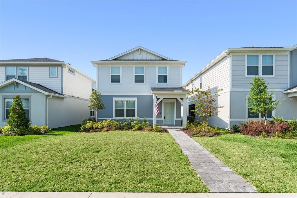 Photo of 10959 Vesper Alley Alley, Orlando, FL 32829 (MLS # O6371218)