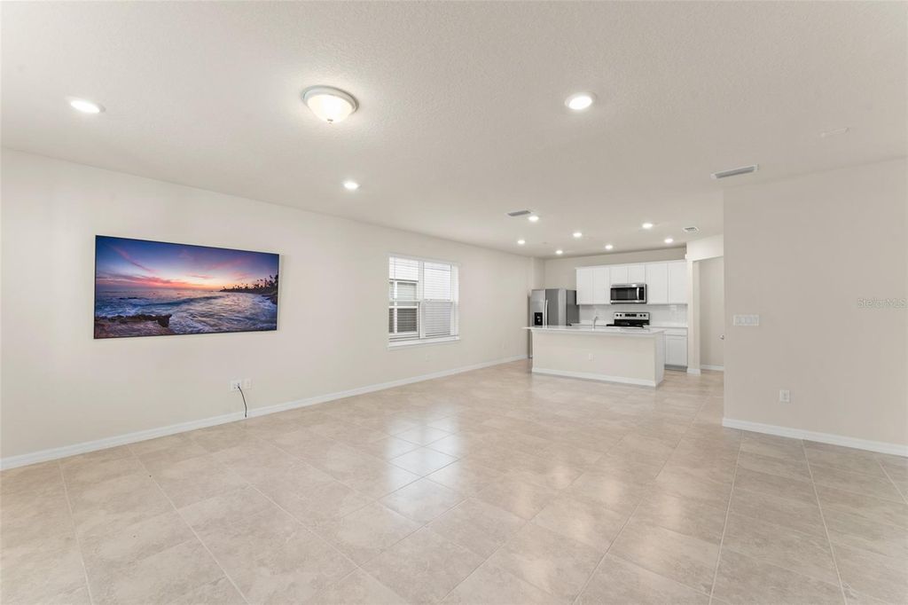 Photo of 10959 Vesper Alley Alley, Orlando, FL 32829 (MLS # O6371218)