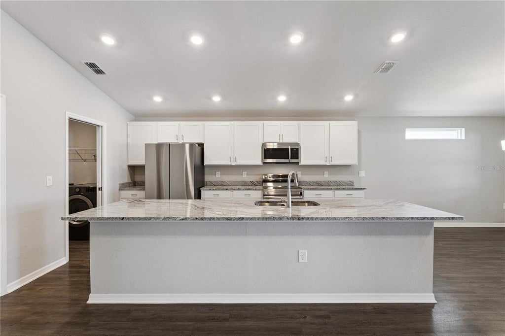 Photo of 1373 Mezzavalle Way, Auburndale, FL 33823 (MLS # G5118375)
