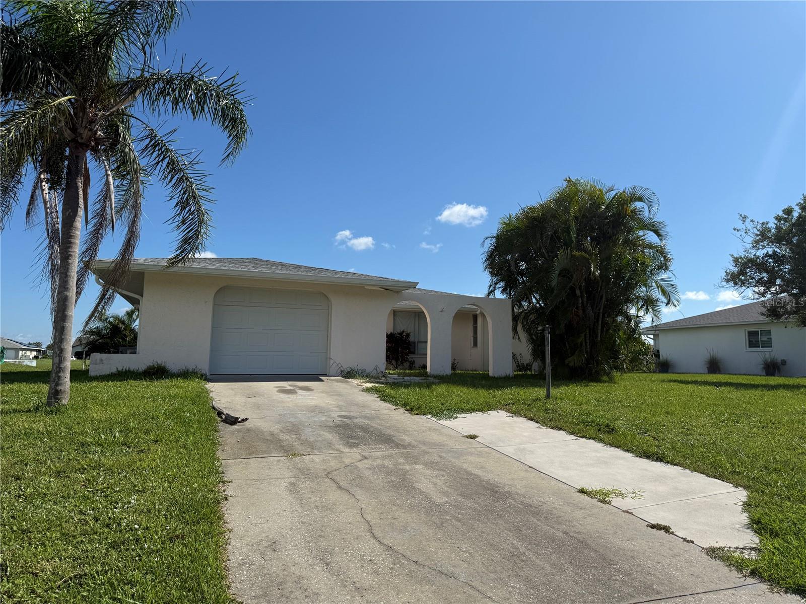 Welcome to this charming 2-bedroom, 2-bath home in the desirable Rotonda West community. Offering 1,303 sq ft of comfortable living space, this residence features an open floor plan with plenty of natural light. Enjoy peaceful water views from the backyard and easy access to nearby amenities including golf courses and parks. Don't miss this opportunity to make it your own! Property sold AS-IS.
