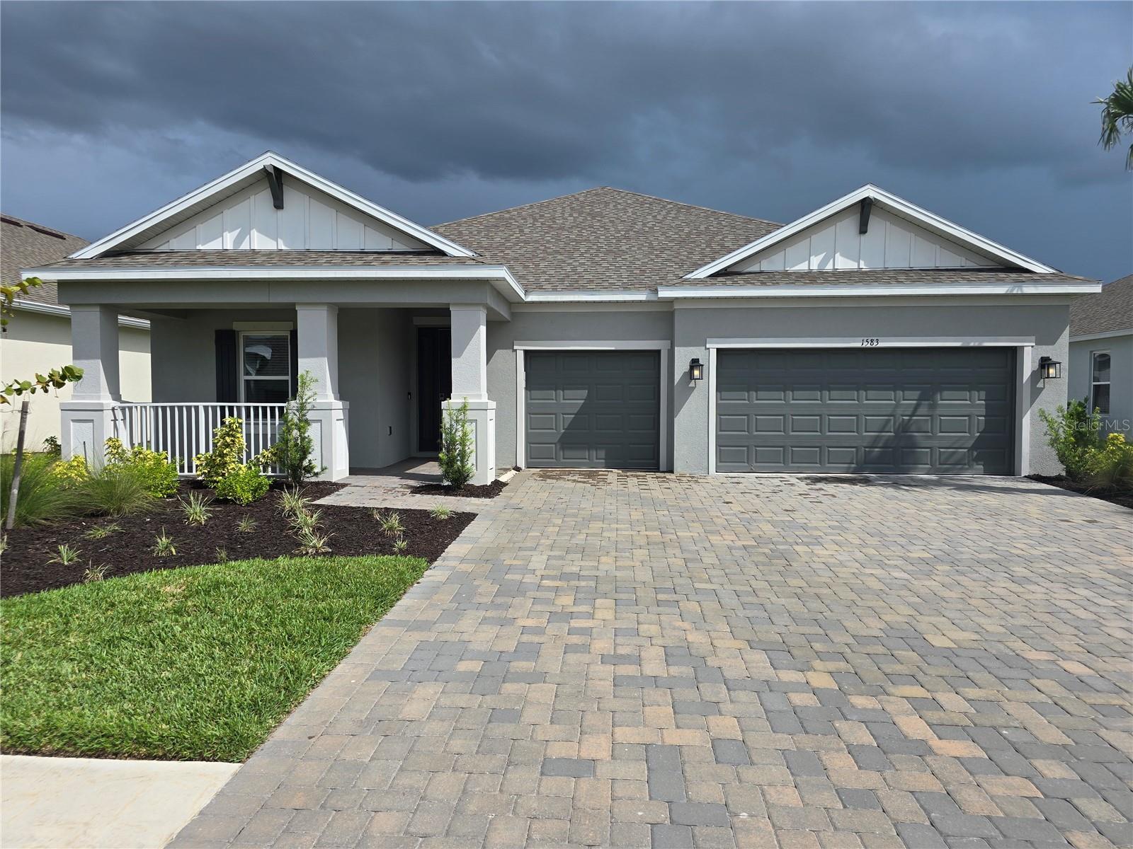 What's Special: Special Incentive | Lake View | Oversized Lot. New Construction – Ready Now! Built by Taylor Morrison, America’s Most Trusted Homebuilder. Welcome to the Maui at 1583 Laurel Brook Lane in The Cove at West Port. This thoughtfully designed new home features an open-concept layout that’s perfect for both everyday living and entertaining. At the heart of the home, the kitchen boasts a center island overlooking the dining area and great room, creating a seamless flow for gatherings. Oversized sliding glass doors lead to a covered lanai, ideal for enjoying Florida’s beautiful climate year-round. The primary suite offers a private retreat with a spa-inspired bath, including a large walk-in shower, walk-in closet, and private commode. Two spacious secondary bedrooms with walk-in closets share a full bath, while a versatile flex space off the foyer adds even more functionality. If you’re searching for a gated, luxurious community in the heart of vibrant Charlotte County, Florida, look no further! Beautiful new homes add a distinct streetscape to this lively community located in the master-planned development of West Port. From exciting amenities including pickleball courts, clubhouse and heated pool, to convenient shopping and dining options within minutes of your new home, you'll never run out of things to do. Visit our decorated models today to envision your dream lifestyle. Additional Highlights Include: Tray ceilings at primary suite, great room, and foyer and shower in place of tub at secondary bath. Photos are for representative purposes only. MLS#A4665118