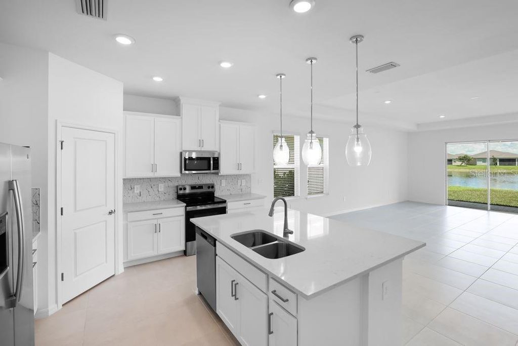 Photo of 1583 Laurel Brook Lane, Port Charlotte, FL 33953 (MLS # A4665118)
