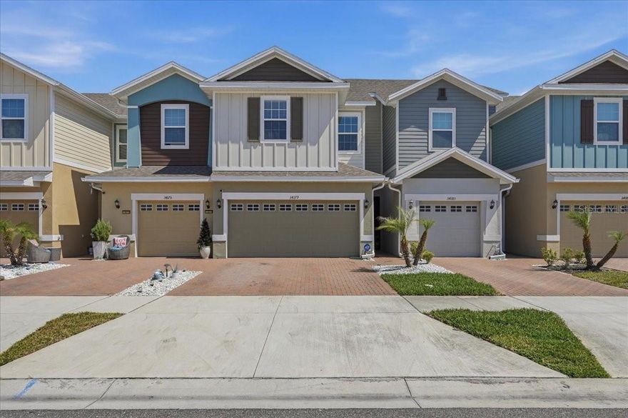 Enjoy low maintenance living with a low HOA fee and NO CDD fee in this bright 3 bed, 2.5 bath, 2 car garage built in 2022 on a CONSERVATION LOT with no backyard neighbors. The kitchen stands out with grey cabinets, granite counters and stainless-steel appliances. Sliding doors lead to your private back patio. The split bedroom layout offers maximum privacy. The primary suite includes a large walk-in closet and ensuite bath with dual sinks and glass enclosed shower. Two additional bedrooms, a full bath, and a large laundry room complete the second floor. This well maintained home also includes access to a community pool, giving you perks of new construction witout the wait.