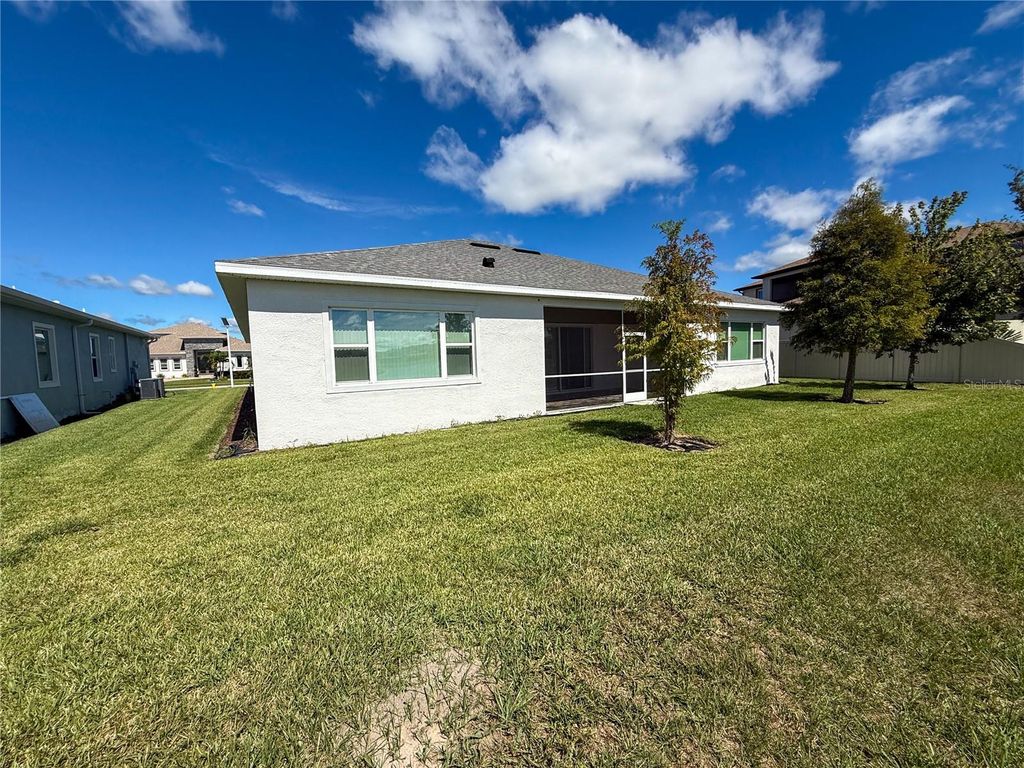 Photo of 8833 Sanders Tree Loop, Wesley Chapel, FL 33545 (MLS # O6352399)