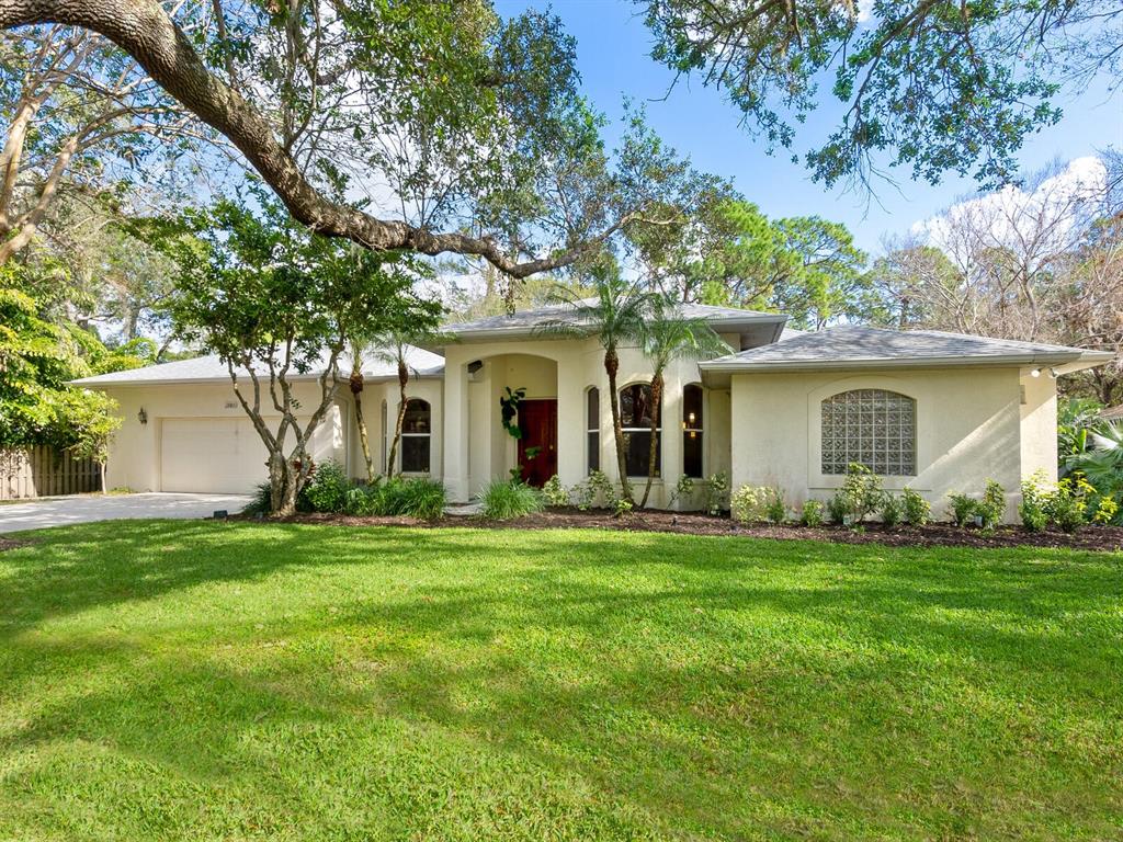 Significant Price Reduction of $75,000. “IT’S LIKE LIVING IN A PARK’, to quote a resident. Torreya, as listed in the tax records, is considered a gem neighborhood of 22- half acre homesites, nestled within coveted Hidden Oaks. A canopy of mature shady oak trees as you meander down Keely Lane, evoke the feel of country living, yet close to everything fabulous about Sarasota. This lovely 3 bedroom, 2 and ½ bath pool home sits on a cul-de-sac off a dead-end street and backs up to a county preserve of 40+ acres protecting the eagle nests within. The layout of this home takes full advantage of this feel of “Old Florida” with its undisturbed nature view with floor to ceiling windows, sliders and French doors all leading out to the pool, and to the outside wood deck just beyond. Real hardwood floors, 4” quality interior window shutters and crown molding throughout compliment the 12 ft high ceilings and spacious open floor plan. Roof, AC, and hot water heater have all been replaced in recent years. Bring your bikes, pets, put on your walking shoes and wave to your neighbors. It is all friendly and wonderful here.