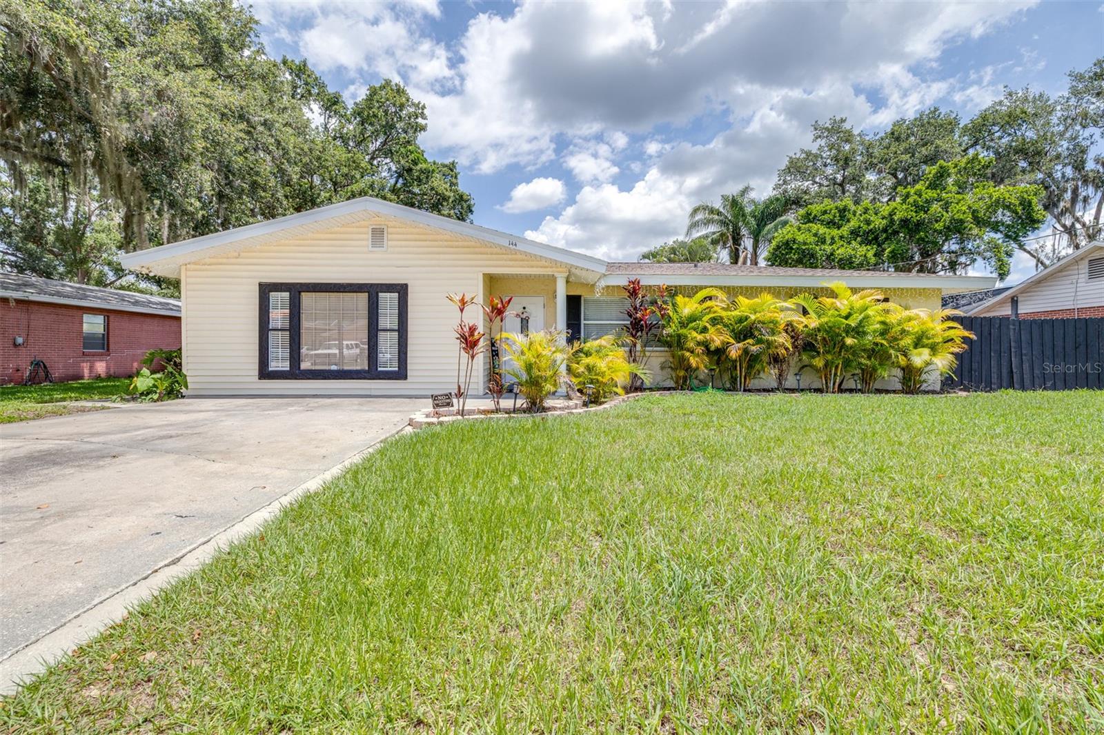 Immaculate and updated pool home ideally located in SE Winter Haven just two blocks from Chain of Lakes access. This well-cared for pool residence features a sleek modern appearance with comfortable living spaces and an impressive level of quality updates found throughout. Extensive list of recent updates include: whole house replumbed 2019, new roof 2019, new AC handler 2019, master bath remodeled 2019, new hot water heater 2019, kitchen remodeled 2021, new luxury vinyl plank flooring 2021, new variable speed pool pump 2024, new pool heater 2022, back and front yard irrigation 2024. Interior features 4 bedrooms (two master suites), 3 bathrooms, formal dining room and an absolutely stunning kitchen. New luxury vinyl plank flooring flows through the main living areas including the spacious great room with relaxing views of the private backyard oasis. The home's large dining room is perfectly sized for entertaining or spending quality time with family. Amazing kitchen is truly a chef's dream with custom soft-close cabinetry, elegant quartz counters, stainless appliances and a top-of-line Ruvati Workstation Sink with accessories. It's easy to unwind in the oversized 20x18 master suite with its tray ceiling, walk-in closet and a spa-like master bath with barn door entry, marble topped vanity, dual sinks, soaking tub and a tiled walk-in shower. Remaining 3 bedrooms are all generously sized, one of which has an en-suite bathroom and could easily function as the home's second master/in-law suite. Inside laundry has plenty of room for a full size washer and dryer as well as extra space for storage. Stepping outside reveals an extended 33' long covered and screened lanai with tranquil views of the open-air and a 30x15 inground pool! A huge fully-fenced backyard and a SmithBuilt storage shed with electric for storing lawn equipment and pool toys or a workshop. There is NO HOA so feel free to bring your boat! Less than a 2 min walk from the Lake Summit boat ramp for easy access to the Winter Haven Chain of Lakes where you can enjoy fishing, skiing or boating any of the 20+ canal-connected lakes or stop for a bite to eat at one of the local lakeside restaurants. Close to Legoland, medical facilities, grocery stores, dining, shopping and conveniently located between Tampa and Orlando. Wonderful established neighborhood close to everything. Come see this one today!