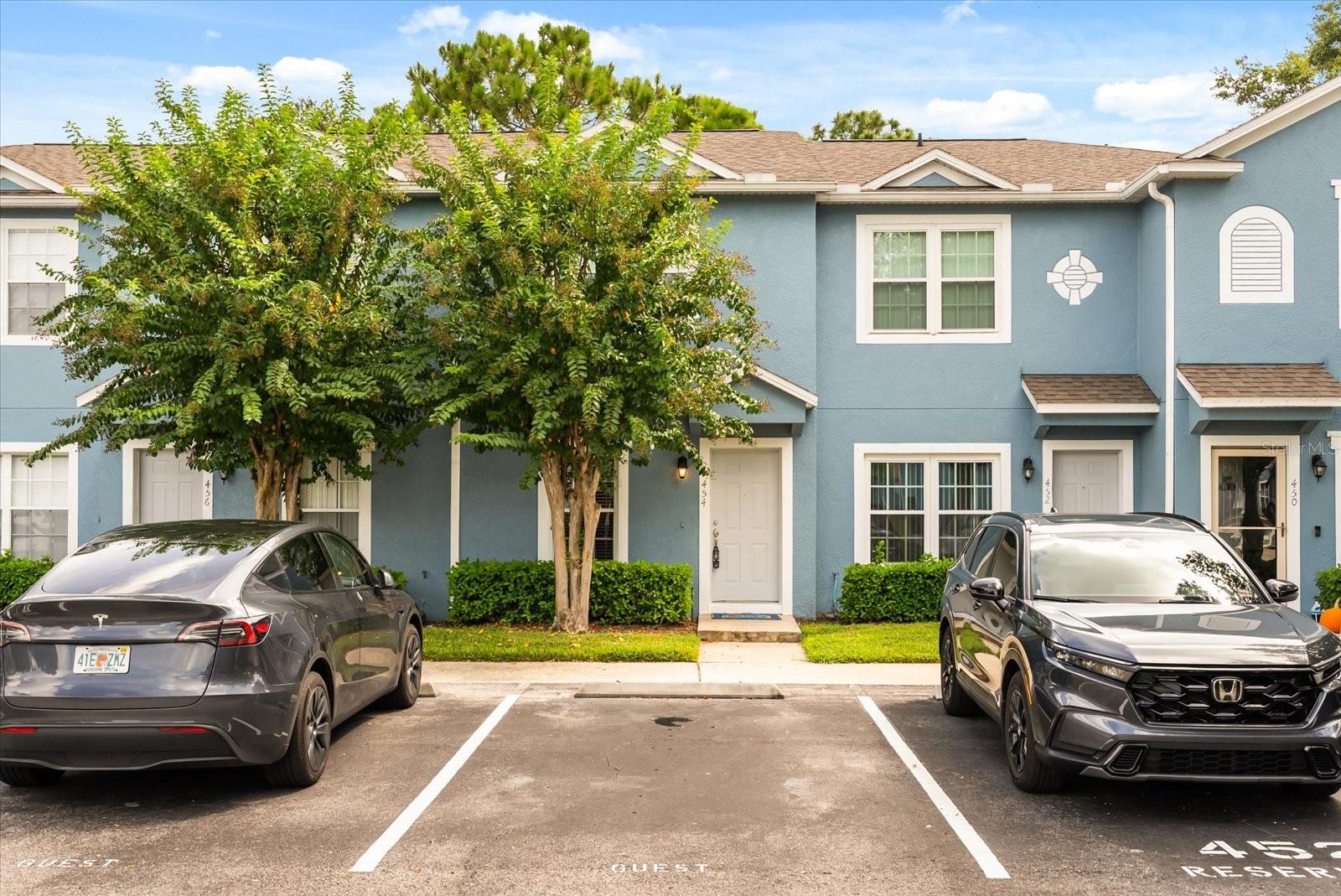 One or more photo(s) has been virtually staged. Welcome to the gated community of Placid Lake Townhomes. This location is exceptional if you love sitting on your screened porch in total peace and quiet, while watching the Florida wildlife outside. Downstairs has a Great room with your recently updated kitchen that features granite countertops, painted solid wood cabinets, stainless farm sink, new disposal and a breakfast bar. Your Dining and Living room have luxury vinyl flooring and excellent views of the conservation area though your sliders. The half bath is conveniently located downstairs also. All carpet has been replaced in 2025, so you'll be the first to live on it. Upstairs you'll find two sizable Primary suites with partial walk-in closets. Both bathrooms have a tub/shower combo. Your laundry closet is in the upstairs hallway and the washer n dryer are included! On your screened lanai, there is a storage closet with a lock. On those hot summer days, you can take a dip at the community pool. There are public restrooms there too. Another bonus of this townhome’s location, is the close proximity to the garbage and 12 guest parking spots. Other recent updates to this home are: Freshly painted inside 2025, AC compressor 2025, kitchen remodel 2025, carpet 2025, Luxury vinyl 2022. The HOA takes care of all outside maintenance. The roofs and painting were recently done. This community is also conveniently close to 417,I-4, the Sanford airport and Historic downtown Sanford. All you need to do is hire the movers!
