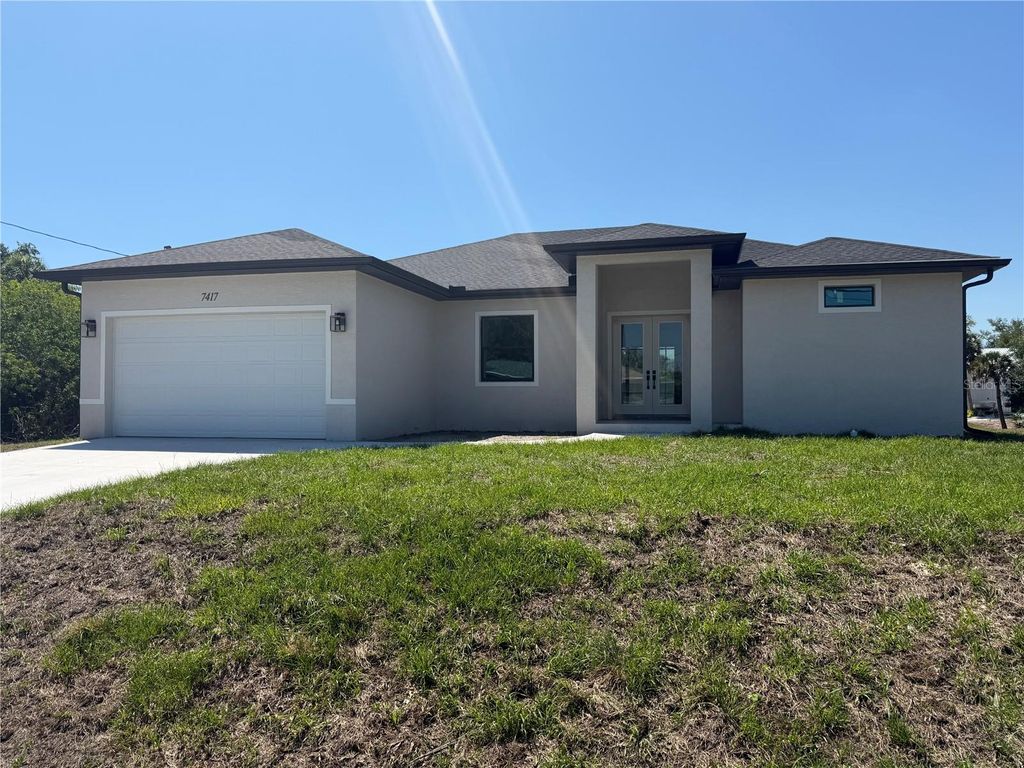 Photo of 7417 Jennifer Drive, Port Charlotte, FL 33981 (MLS # C7526265)