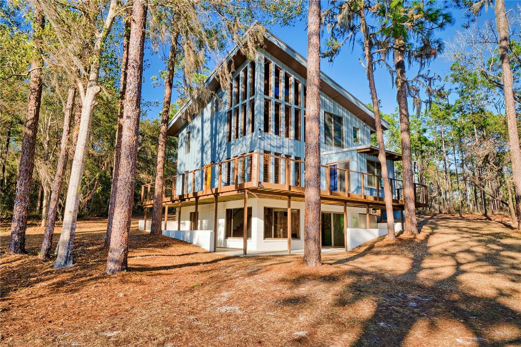 Photo of 123 Mason Lake Trail, Hawthorne, FL 32640 (MLS # GC538469)